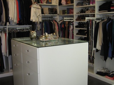 glass top closet island with drawers