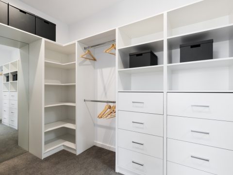 Large walk in wardrobe cabinetry in thermofoil