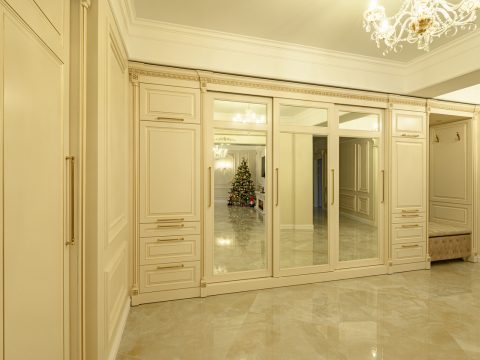 Interior of modern luxury beige and golden corridor and entrance hall
