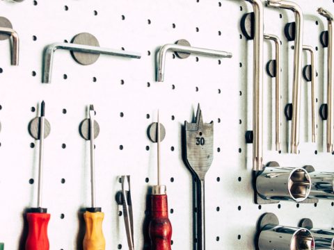 Various tools for working on aluminum surfaces on the wall