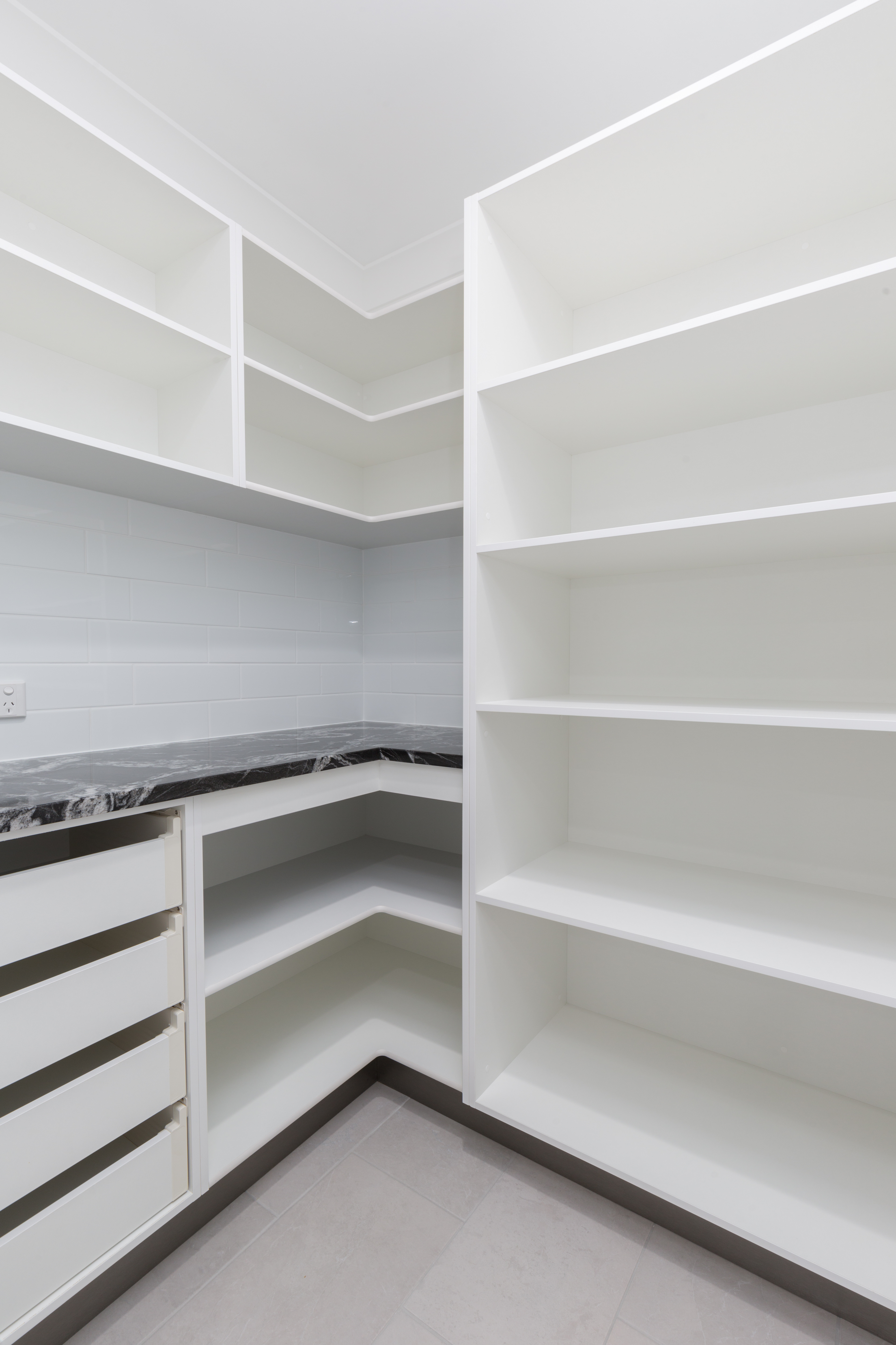 The Pros And Cons Of Cabinet vs. Walk-In Pantries - Featured Image